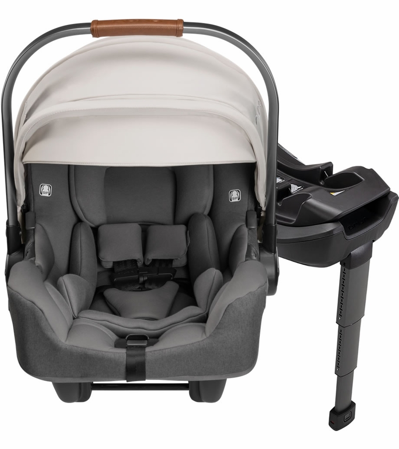 Nuna PIPA RX Lightweight Infant Car Seat + RELX Base with Load Leg Birch