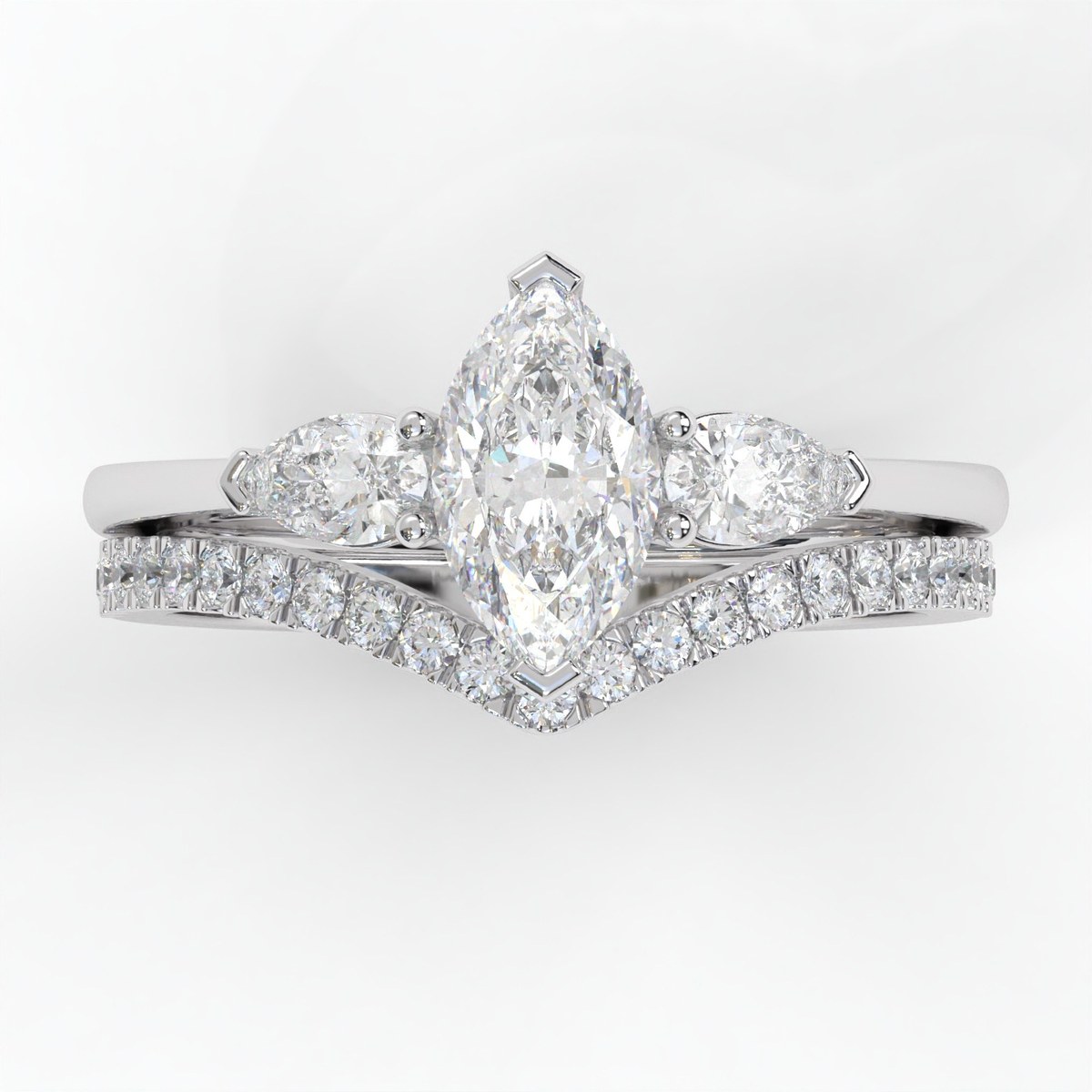 A Curved Diamond Wedding Band for a Marquise & Pear Ring