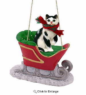 Black and White Cat Sleigh Ride Christmas Ornament