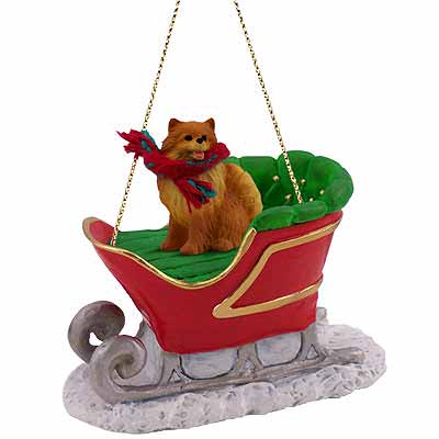 Pomeranian Sleigh Ride Christmas Ornament Red