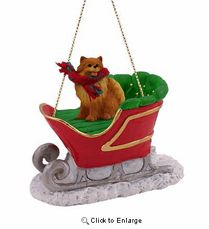 Pomeranian Sleigh Ride Christmas Ornament Red