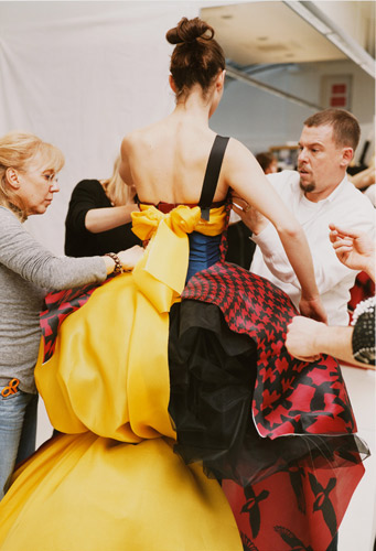 Featured image, of Alexander McQueen adjusting one of his Fall 2009 designs, is reproduced from Damiani
