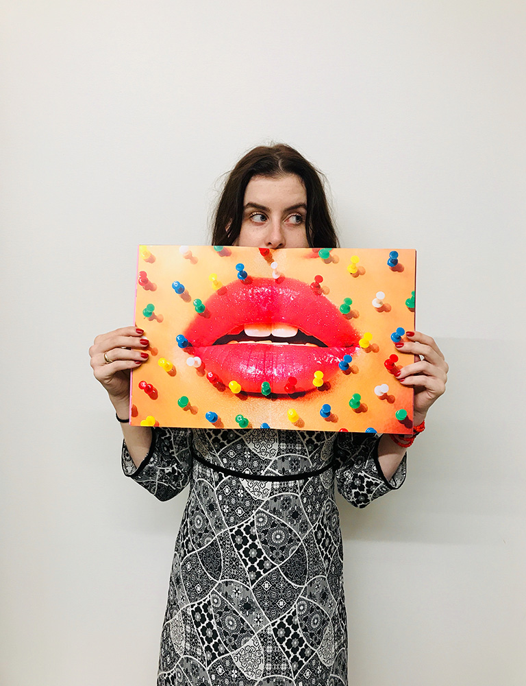 Intern Catherine Readick with "Toilet Paper 16," photographed by fellow intern Reilly Davidson.