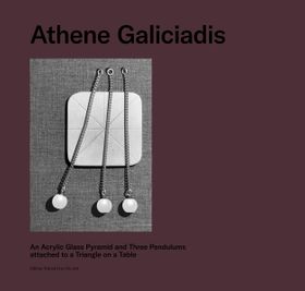 Athene Galiciadis: An Acrylic Glass Pyramid and Three Pendulums attached to a Triangle on a Table