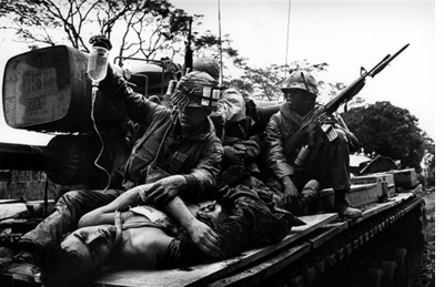 Don McCullin, US Soldier Rescuing Vietnamese Woman