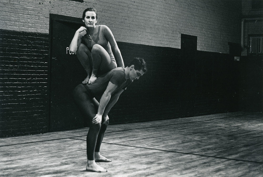 Peter Moore. Performance view of Trisha Brown and Steve Paxton in Browns 