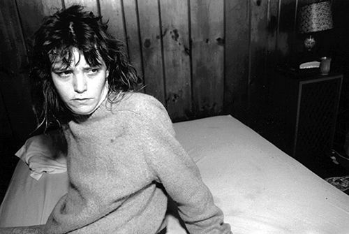 Mary Ellen Mark: Tiny, Streetwise Revisited, Tiny Sitting on the Bed