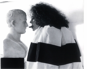 "Isabelle Collin Dufresne moved to New York in 1953 and was befriended by many of the days renowned artists, including Salvador Dali. Dali introduced her to Warhol in 1963, and she became one of the best-known 'superstars.' She took the name Ultra Violet after seeing the words in <I>Time</I> magazine." Featured image, by Shunk-Kender, is reproduced from , <a href="9780970612618.html">The Autobiography and Sex Life of Andy Warhol</a>