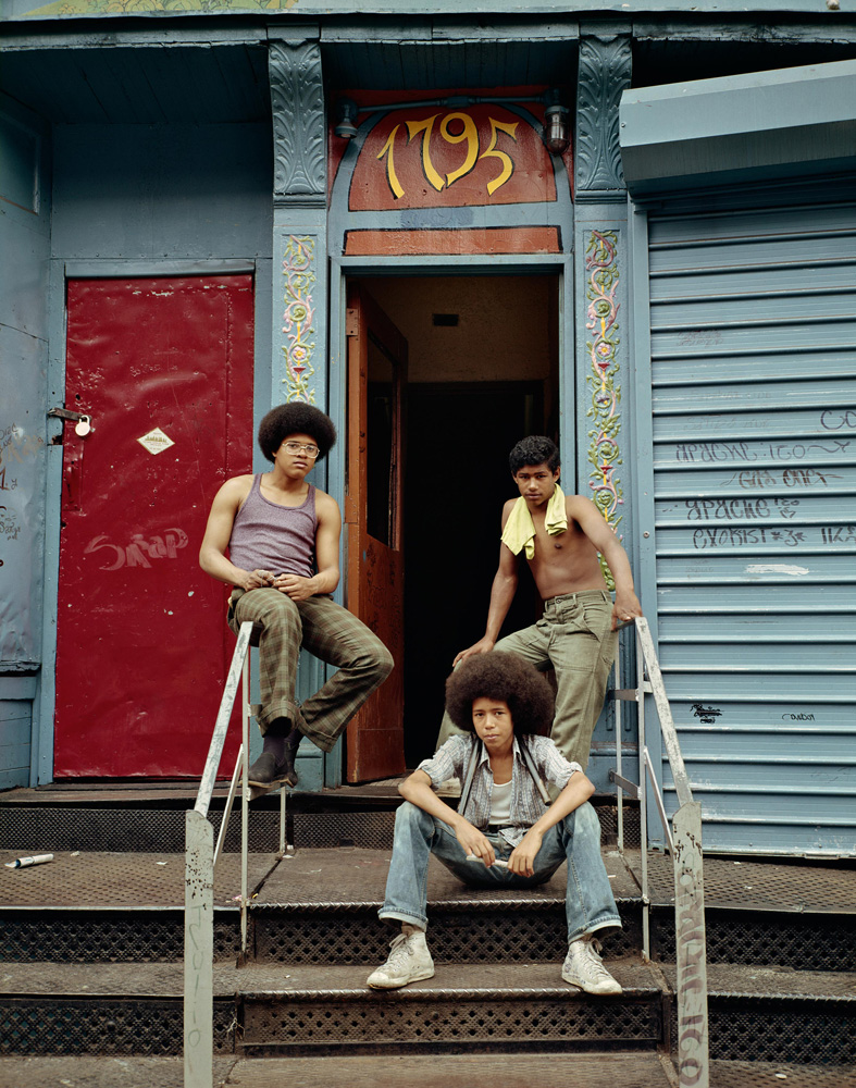 "Three boys at the front door" (1975) is reproduced from