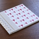 baby's first book - pink bunting by rag & bone bindery
