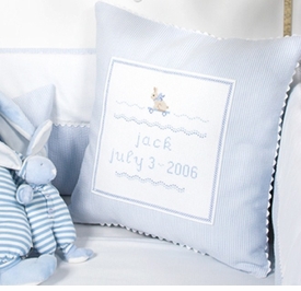 blue bunny on a skateboard hand embroidered pillow