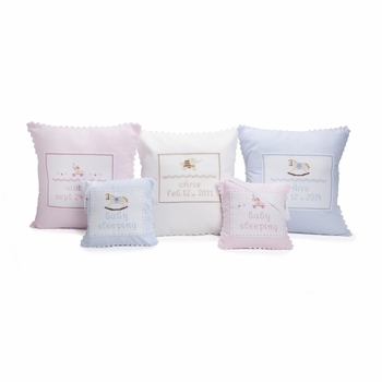 embroidered pink baby rocking horse pillow