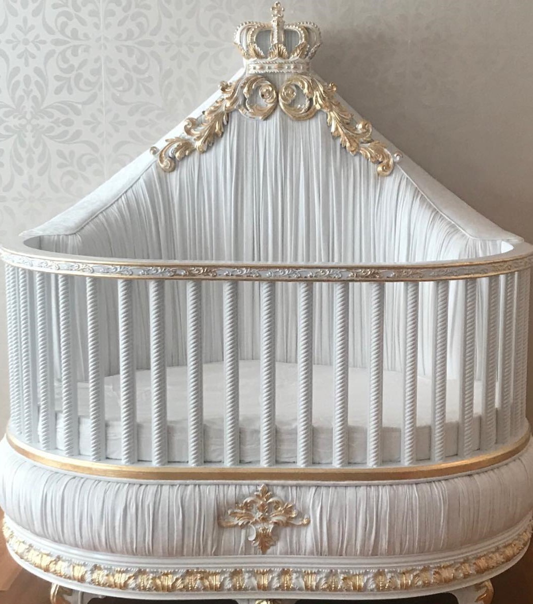upholstered regal crown crib featured at