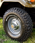 Tires 33" x 10.5"x15" Stock Wheels & Caps
