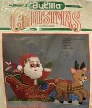 Dashing Through the Snow Doorstop, Christmas plastic canvas kit (Bucilla)
