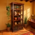 Rustic Red Painted Wood Book Shelf with Iron Scrolls and Iron Panel Doors