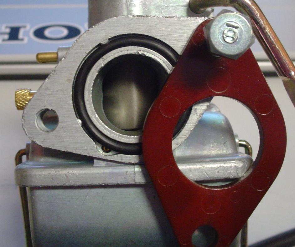  possible insulator for offset carbs