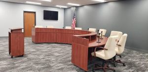 BUDGET COURTROOM FURNITURE: COUNCIL CHAMBERS DESKS, HALF MOON CONFERENCE TABLES, JUDGES DESKS, ATTORNEY DESKS, WITNESS/COURT REPORT DESKS, LECTERNS, COURTROOM SEATING.