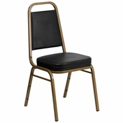 TOUGH ENOUGH SERIES TRAPEZOIDAL BACK STACKING BANQUET CHAIR IN BLACK VINYL - GOLD FRAME: <font color=green>FREE SHIPPING!</font>