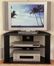 Corner TV Stand with Glass Shelf in Black - 4D Concepts - 64935