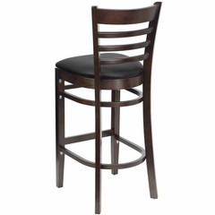 HERCULES Ladder Back Walnut Wood Bar Stool with Black Vinyl Seat - XU-DGW0005BARLAD-WAL-BLKV-GG