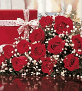 One Dozen Red Roses with 7 oz. Belgian Truffles $ 80.00