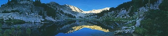 STEPHEN E LYMAN 60X14 Secondary Market Art: "SUNRISE WALLOWAS GCNV"