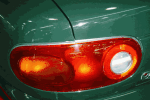 <FONT COLOR=" FF0000">*CLEARANCE ITEM*</FONT> Genuine Mazda Miata OEM Tail Lamp Lens & Housing 1999-2005