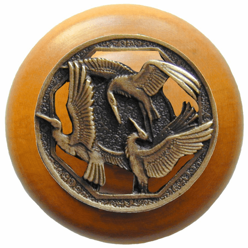 NHW-737M-AB Crane Dance Wood Knob in Antique Brass/Maple wood finish 1-1/2" Dia 1-1/8" Proj Lodge & Nature Collection by Notting Hill