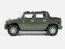2004 Hummer H2 SUT Diecast model car 1:18 scale die cast by Maisto - Green
