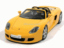 2005 Porsche Carrera GT diecast model car 1:18 scale die cast by AUTOart - Yellow