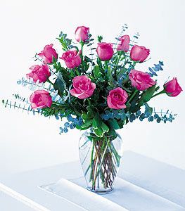 A dozen pink roses