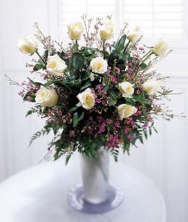 A dozen white rose bouquet