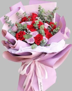 Bouquet of red roses and lavender