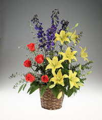 Bright flowers arranged in a basket 