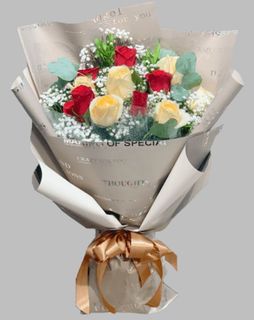 Bouquet of red roses and cream peach