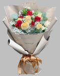 Bouquet of red roses and cream peach