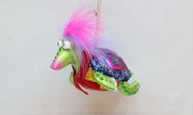 December Diamonds Painted glass turtle with feather holiday ornament