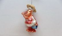 December Diamonds glass Pelican in swimsuit holiday ornament