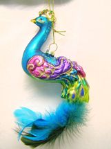 December Diamonds Pink, purple and turquoise glass Peacock ornament