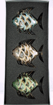 Seasons Designs clear glass fish ornaments in mutli colored glitter 