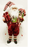 Season's Designs 20" Peppermint Candy cane Santa Claus on Snow Base 