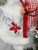 Seasons Design  24" lighted Santa Claus with white poinsettia jacket