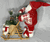 Seasons Designs 18" Santa Claus on wooden sleigh with teddy bear