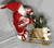 Seasons Designs 18" Santa Claus on wooden sleigh with teddy bear