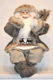 Seasons Designs 24" sitting Santa in brown coat holding twigs