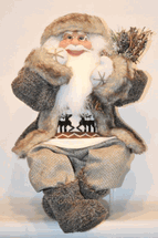 Seasons Designs 24" sitting Santa in brown coat holding twigs