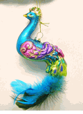 December Diamonds Pink, purple and turquoise glass Peacock ornament