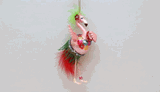 December Diamonds glass flamingp with green feather holiday ornament