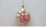 December Diamonds pink and gold spiral seashell holiday ornament shell